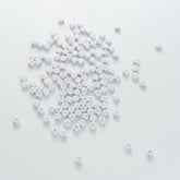 BD00108-03-silver-letter-white-opaque-coin-alphabet-beads-single-y-4×7mm